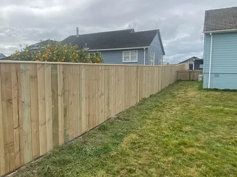 New timber paling fence along a lawn, Palmerston North