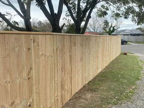 New timber fence along the edge of a driveway, Palmerston North