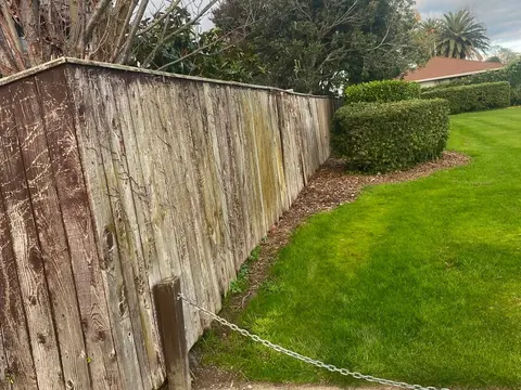 Old leaning timber fence before replacement, Palmerston North