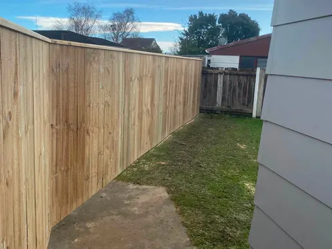 New timber fence along a side path beside a house, Palmerston North