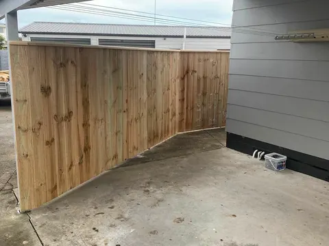 Timber fence panel beside a carport, Palmerston North
